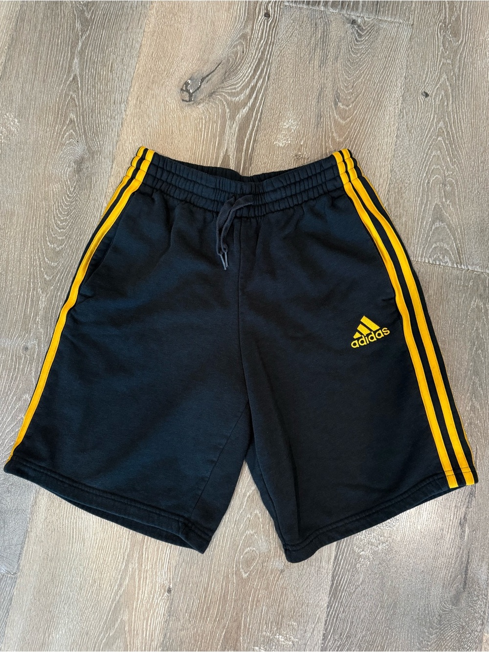 adidas Black Athletic Shorts with Yellow Stripe Accents